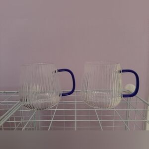 Set Of 2 Clear Ribbed Glass Mugs with Blue Handle